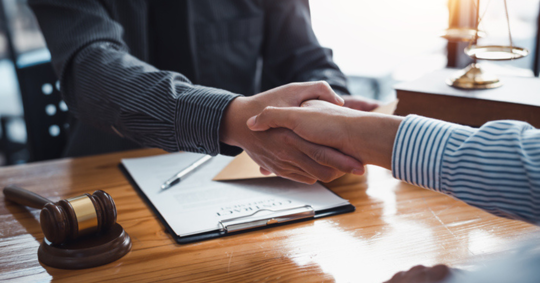 Shaking lawyers hand
