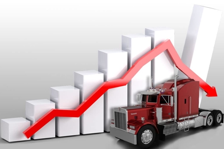 Graphic of a truck driving by a chart that is going downhill