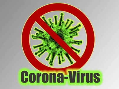 Graphic of corona-virus with a red slash crossing it out