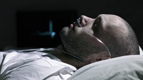 person on hospital bed